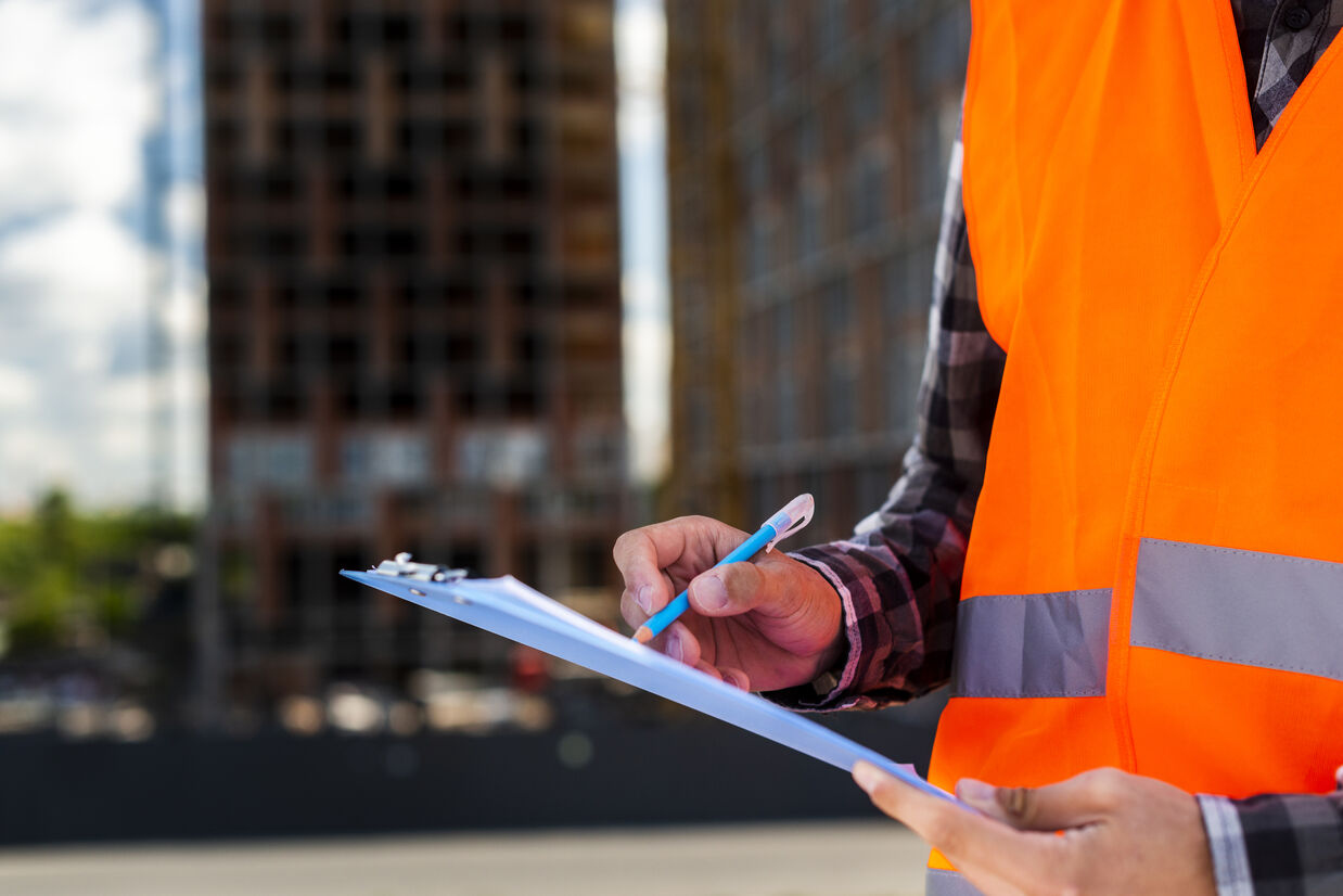 close up construction engineer writing_optimized_300
